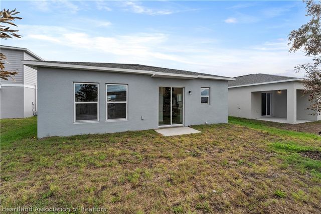 2077 GOLDEN BEAK Drive, Eagle Lake, FL 33839