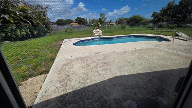 2209 SE East Dunbrooke Circle, Port St. Lucie, FL 34952