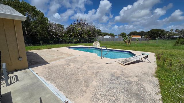 2209 SE East Dunbrooke Circle, Port St. Lucie, FL 34952