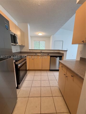7950 N Nob Hill Rd 202, Tamarac, FL 33321