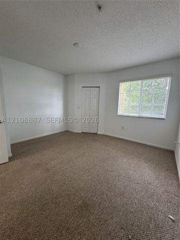7950 N Nob Hill Rd 202, Tamarac, FL 33321