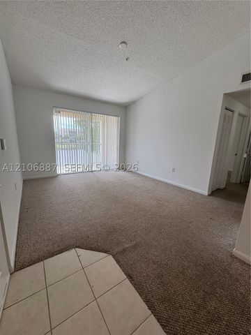 7950 N Nob Hill Rd 202, Tamarac, FL 33321