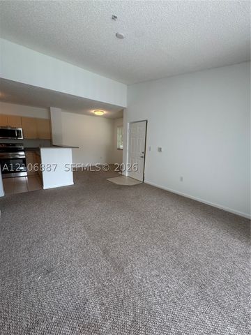 7950 N Nob Hill Rd 202, Tamarac, FL 33321