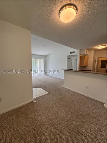 7950 N Nob Hill Rd 202, Tamarac, FL 33321