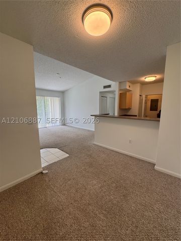 7950 N Nob Hill Rd 202, Tamarac, FL 33321