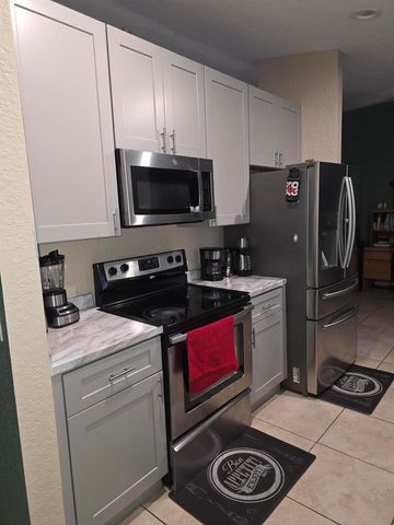 557 SW Baoy Avenue, Port St. Lucie, FL 34953