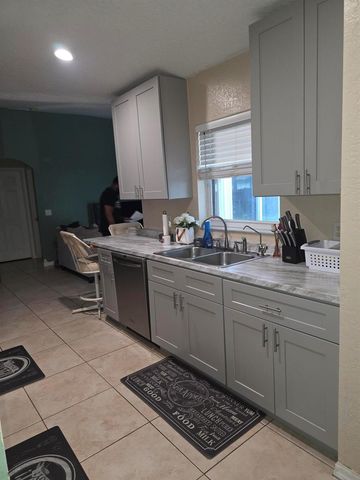 557 SW Baoy Avenue, Port St. Lucie, FL 34953
