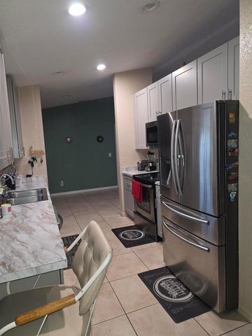557 SW Baoy Avenue, Port St. Lucie, FL 34953