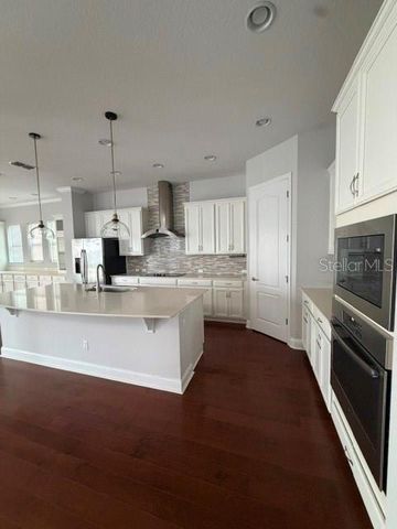 8001 NEMOURS PARKWAY, Orlando, FL 32827