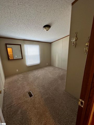 207 Elijah Simmons Road, Woodruff, SC 29388