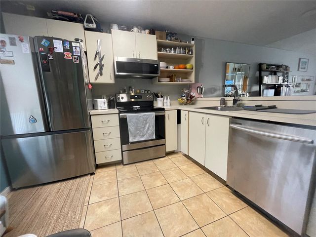2516 WOODGATE BOULEVARD 205, Orlando, FL 32822