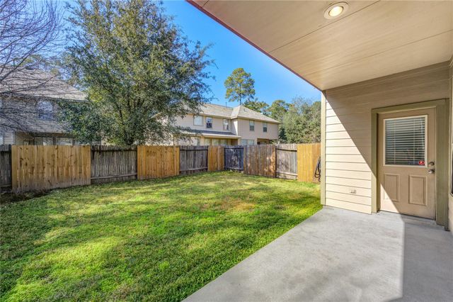 82 W Twinvale Loop, Conroe, TX 77384