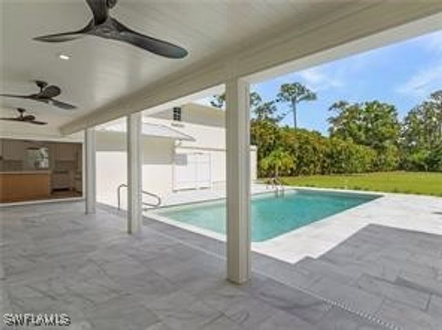 6155 Standing Oaks LN, Naples, FL 34119