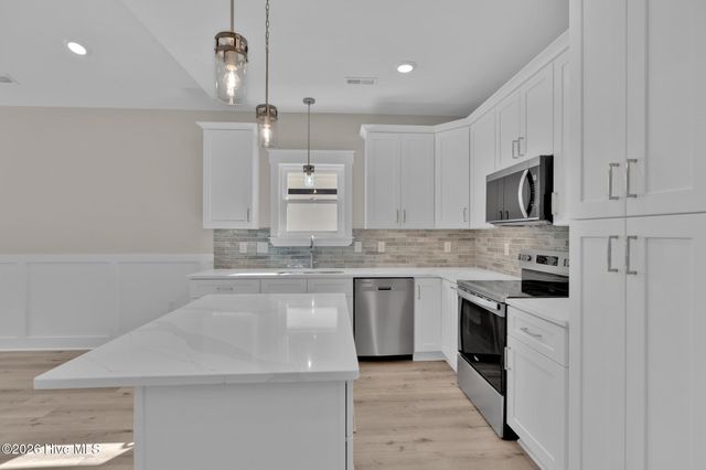 225 NE 75th Street, Oak Island, NC 28465