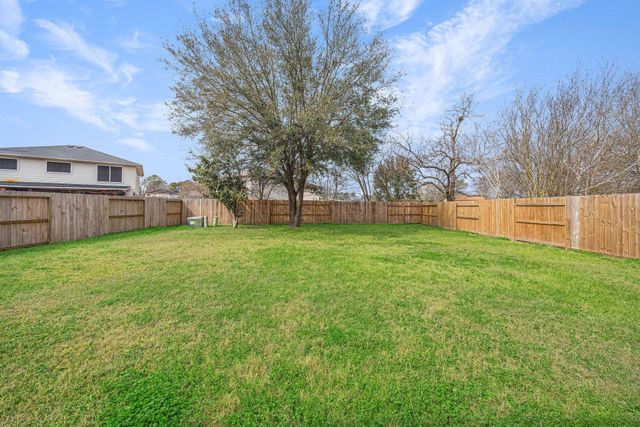 8211 Scarlet Tanager Drive, Humble, TX 77396