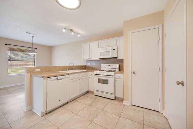 8211 Scarlet Tanager Drive, Humble, TX 77396