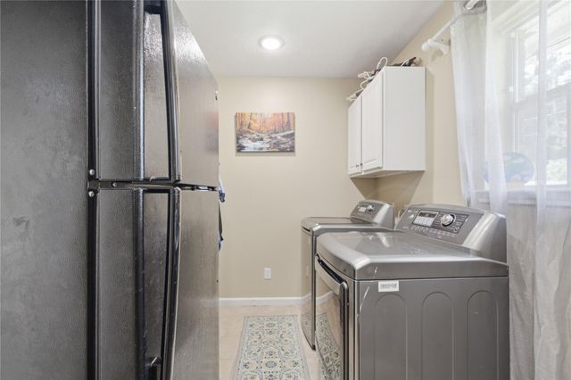 423 E Oak Hill Drive, Oak Ridge North, TX 77386