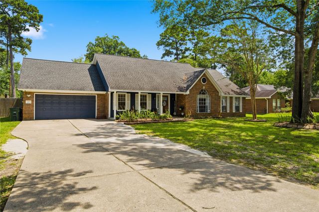 423 E Oak Hill Drive, Oak Ridge North, TX 77386