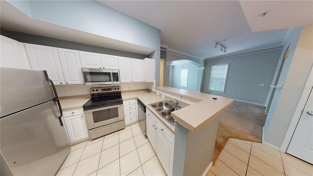 235 GOLDENRAIN DRIVE 303, Celebration, FL 34747