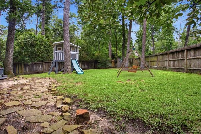 6 Wind Poppy Court, The Woodlands, TX 77381