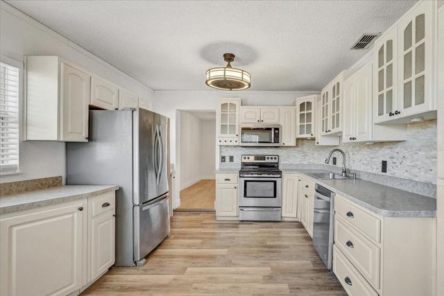 7012 PIN CHERRY LANE, Port Richey, FL 34668