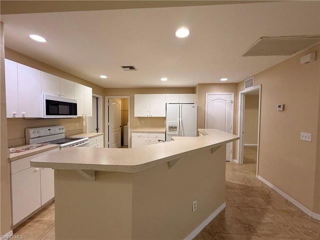 208 Homewood AVE S, Lehigh Acres, FL 33974