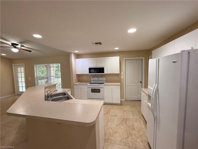 208 Homewood AVE S, Lehigh Acres, FL 33974