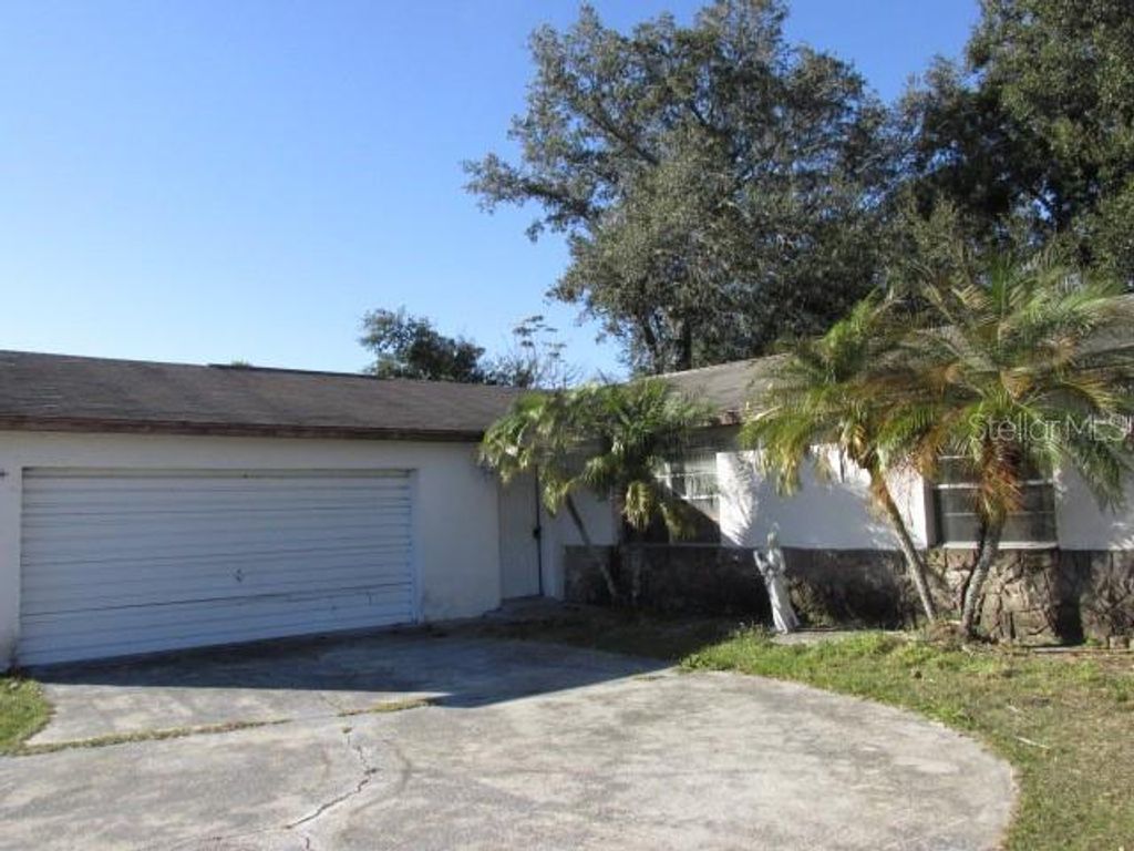 Image 1 of property listing at 7651 RIO PINAR LAKES BOULEVARD, Orlando, FL 32822