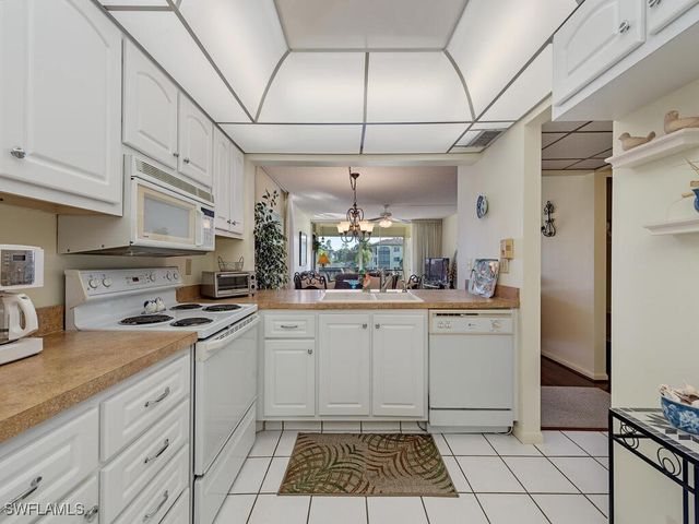 1087 Forest Lakes DR 1-201, Naples, FL 34105