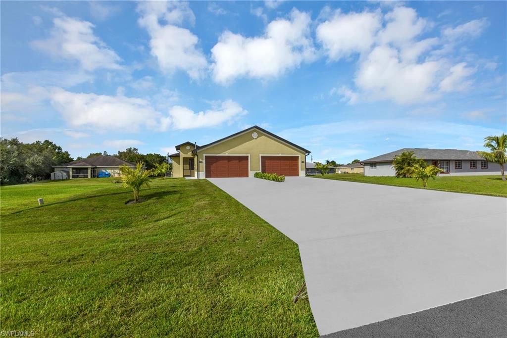 2625/2627 SUNNILAND BLVD, LEHIGH ACRES, FL 33971 — photo 2