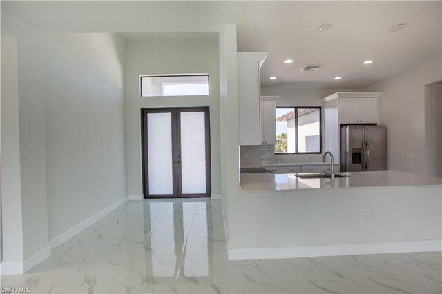 1227 SE 3rd AVE, Cape Coral, FL 33990