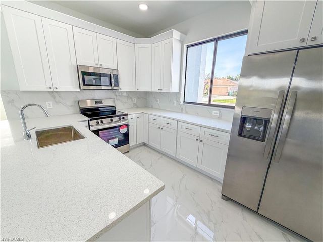 1227 SE 3rd AVE, Cape Coral, FL 33990