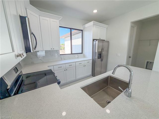 1227 SE 3rd AVE, Cape Coral, FL 33990