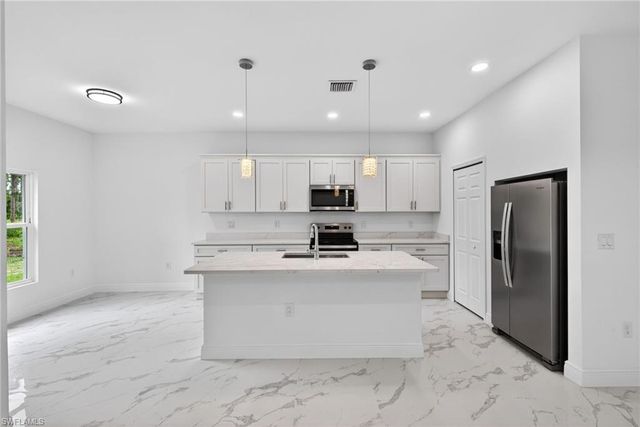 810 Jackson AVE, Lehigh Acres, FL 33972