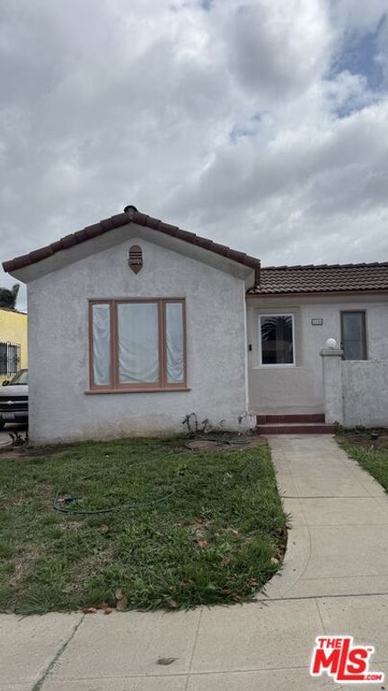 Image 1 of property listing at 1440 W 91st Place, Los Angeles, CA 90047