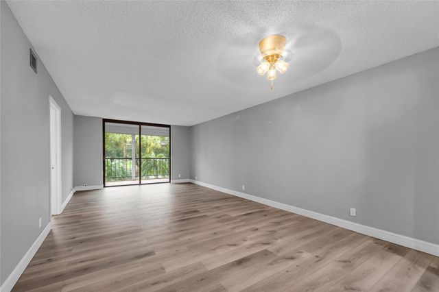 2400 Deer Creek Country Club Blvd 202, Deerfield Beach, FL 33442