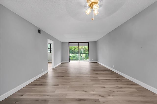 2400 Deer Creek Country Club Blvd 202, Deerfield Beach, FL 33442