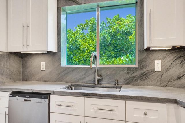 5 Gatehouse Road, Sea Ranch Lakes, FL 33308