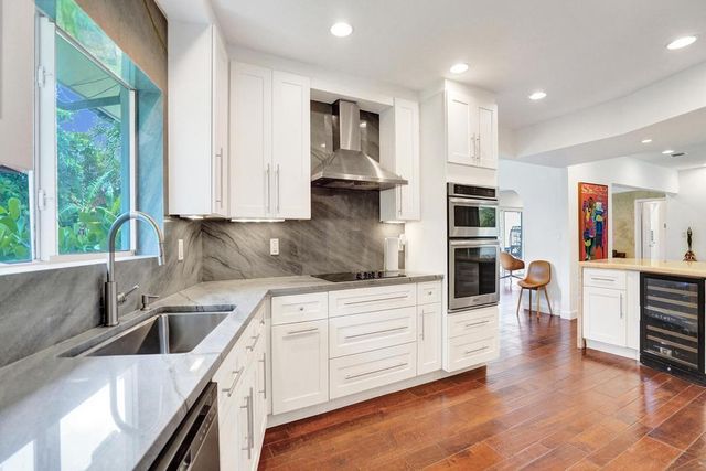 5 Gatehouse Road, Sea Ranch Lakes, FL 33308