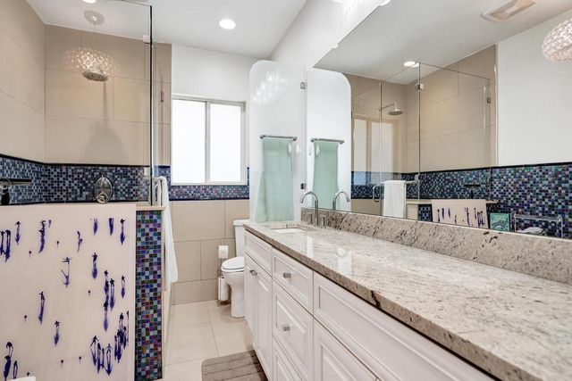 5 Gatehouse Road, Sea Ranch Lakes, FL 33308