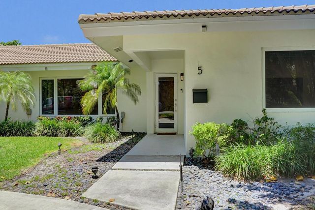 5 Gatehouse Road, Sea Ranch Lakes, FL 33308
