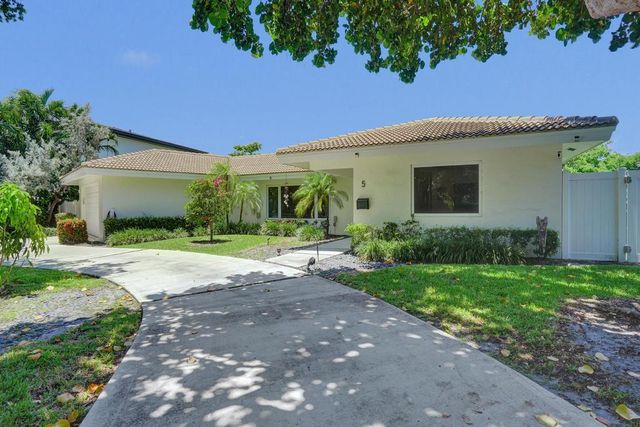 5 Gatehouse Road, Sea Ranch Lakes, FL 33308
