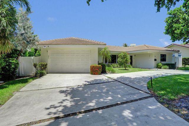 5 Gatehouse Road, Sea Ranch Lakes, FL 33308
