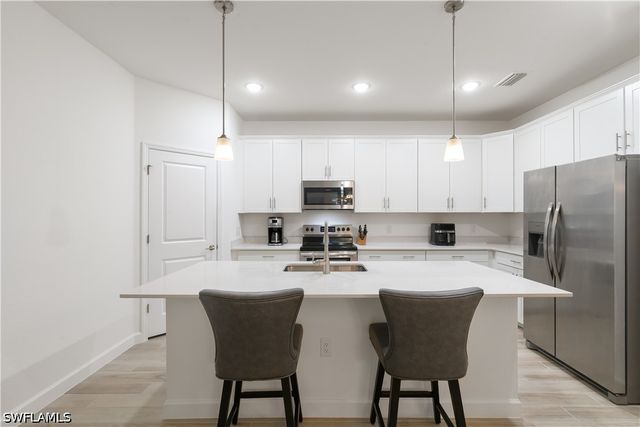 1473 Birdie DR, Naples, FL 34120