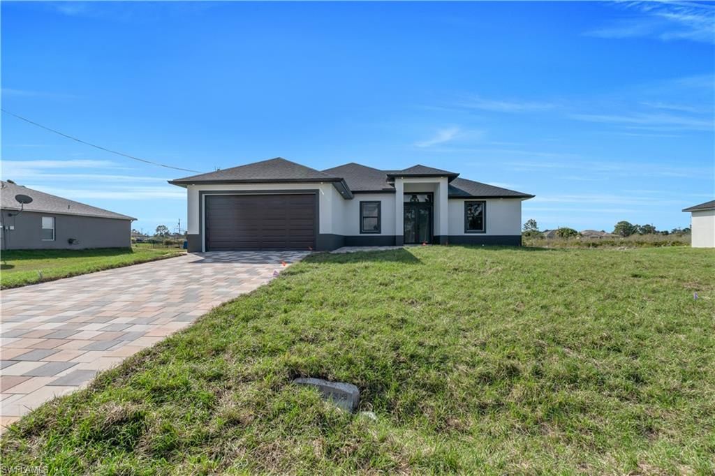 1304 Lee AVE, Lehigh Acres, FL 33972