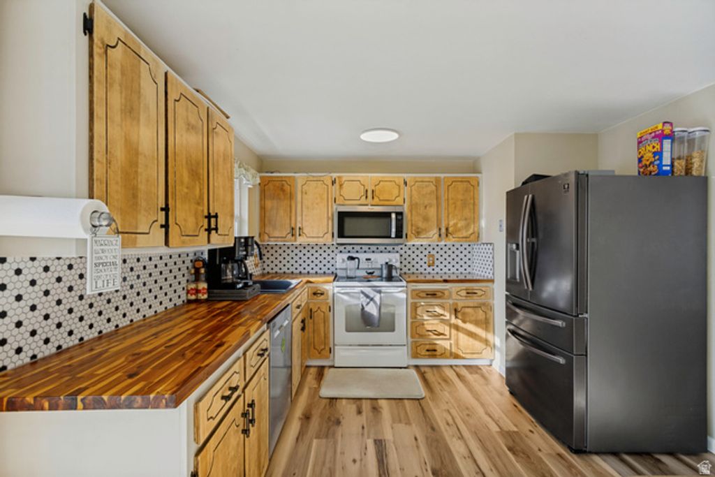 6015 S DON QUIXOTE DR, Taylorsville, UT 84129 — photo 5