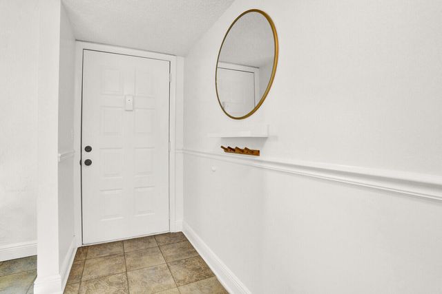 4715 Lucerne Lakes Boulevard E 103, Lake Worth, FL 33467