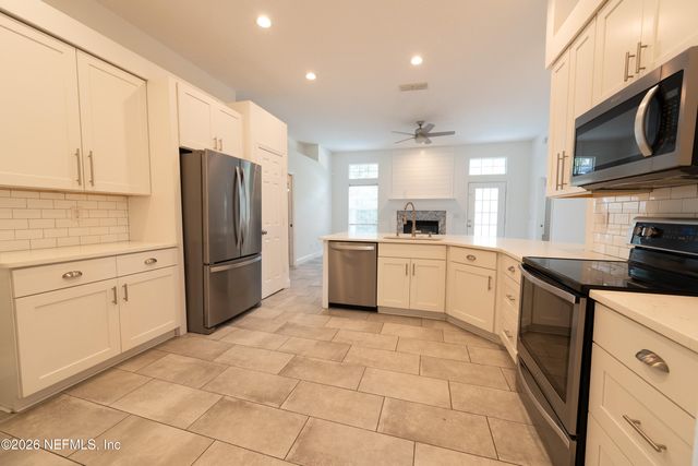 1673 TALL TREE Drive E, Jacksonville, FL 32246