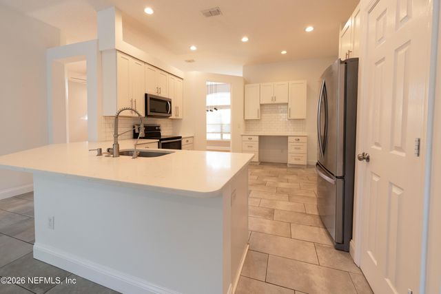 1673 TALL TREE Drive E, Jacksonville, FL 32246