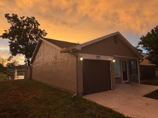 22979 Sandalfoot Boulevard, Boca Raton, FL 33428